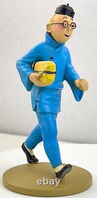 LTD RELEASE Tintin Figurine Moulinsart 42157 Tintin carrying Package Blue Lotus